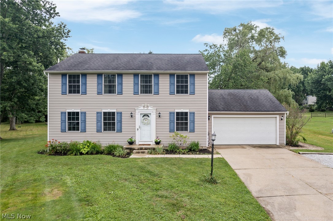 Welcome home to Carver Lane! This four bedroom, two and a half bath colonial, tucked away on a quiet cul de sac is ready for its new owners! Freshly painted throughout, with new carpet, and luxury vinyl makes this home move in ready. Other updates include the furnace, air conditioning, hot water heater, windows, kitchen cabinetry, electrical, stamped concrete patio, gutter guards, and more! Summers are when this home really shines under the lights and festivities of the annual Hudson 4th of July Fireworks show putting on its display right out your back door at Barlow Park. When not in your park like backyard, head over to Barlow Park and you'll find multiple ball diamonds, soccer fields, walking paths, pond, tennis courts, pickleball, playground, and pavilions. This home and neighborhood has so much to offer, don't let this one slip you by, call today to schedule your showing!!
