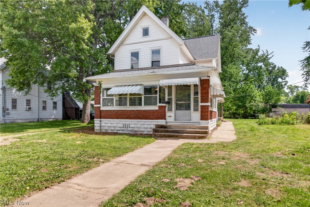 Step back in time and fall in love with the charm and character of this beautiful 4-bedroom century home in Norwalk! From the moment you arrive, you'll appreciate the timeless craftsmanship, including stunning original woodwork, elegant pillars separating the living room and study, and gorgeous inlaid wood flooring.

The first-floor primary bedroom features beautiful glass French doors, while the formal dining room showcases a decorative original fireplace, cozy window seat, and impressive coffered ceilings. The spacious kitchen offers plenty of room for cooking and gathering, with a convenient mudroom and first-floor laundry nearby.

Enjoy relaxing on the huge enclosed front porch or entertaining on the covered back patio. Upstairs you'll find three additional bedrooms with newer LVT flooring and a bonus room ready for your finishing touches.

Recent updates include a new roof (2023), new flooring in the kitchen, bathroom, and upstairs (2026), new bathroom sink and toilet (2026), and a new tub (2020). The detached garage offers electric service for added convenience.