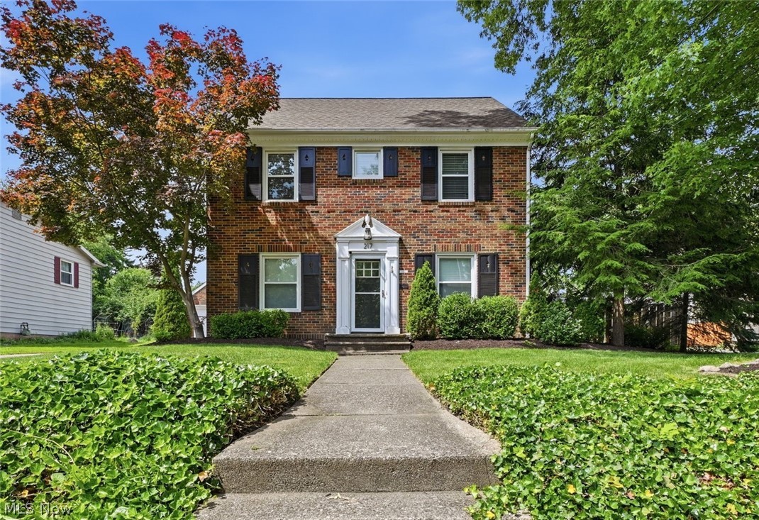 If History had a picture, this North Canton home would be it!! Offering nearly 2,000 square feet of living space in this classic Colonial Revival, this move-in ready residence features 3 spacious bedrooms, 2.5  baths, and a thoughtfully designed floor plan perfect for everyday living and entertaining. The fully remodeled kitchen showcases modern finishes and functionality, while the expansive living room is highlighted by gorgeous hardwood flooring and abundant natural light. A stylish sunroom provides the perfect retreat to relax and enjoy views of the beautifully landscaped grounds. The updated bathrooms add a fresh, contemporary touch, and the lower level offers exceptional storage space and additional living area. Outside, you'll find a rare oversized 3-car garage and your very own full-size bocce court, creating the perfect setting for recreation and gatherings with corn hole, horseshoes, or maybe even a large garden option! Combining timeless Colonial architecture with modern updates and unique amenities, this exceptional home is truly a must-see.