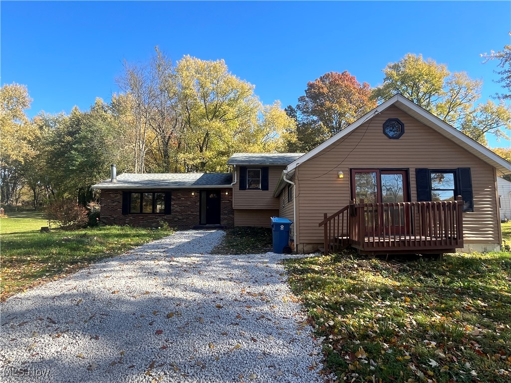 Rare Dual-Living Opportunity in Coventry Township, just minutes from Arlington Rd and Route 77! Don’t miss your chance to own this exceptional live-in home with investment property- offering flexibility, space, and value! This unique home includes a main split-level residence featuring 3 bedrooms and 2 full bathrooms, plus a separate in-law suite with all on one-living level with 2 bedrooms, an updated kitchen, and a modern bathroom—perfect for extended family, guests, or rental income. The main home impresses with brand new carpet throughout, a fully updated kitchen with new appliances and laminate flooring, and an upstairs laundry for ultimate convenience. The primary suite includes its own private ensuite bath, while a full unfinished basement offers endless potential for added living space or storage. The in-law suite has been refreshed with new windows and is move-in ready—ideal for generating income or providing comfortable independent living. Outside, enjoy a fully fenced backyard with a sliding door off the eat-in kitchen, perfect for entertaining or relaxing. Additional updates include a freshly graveled driveway with plenty of parking. Whether you’re looking for a single residential home or a property with built-in investment potential, this Coventry Township gem is a rare find. Schedule your showing today and make this versatile home yours!