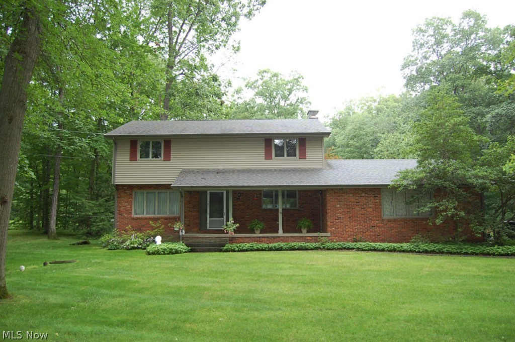 Large 4 bedroom brick and vinyl 2 story on a 3.4 acre lot.  Features include living room, family room with fireplace, equipped kitchen, huge 21x20 enclosed back porch with hardwood floor.  This home also has a 40x20 built in heated pool, shed 12x10 and a 29x24 barn.  The main bath on 2nd floor has been totally remodeled with ceramic and granite. This home is on a private dead end street with lots of trees. This home has a Home Warranty