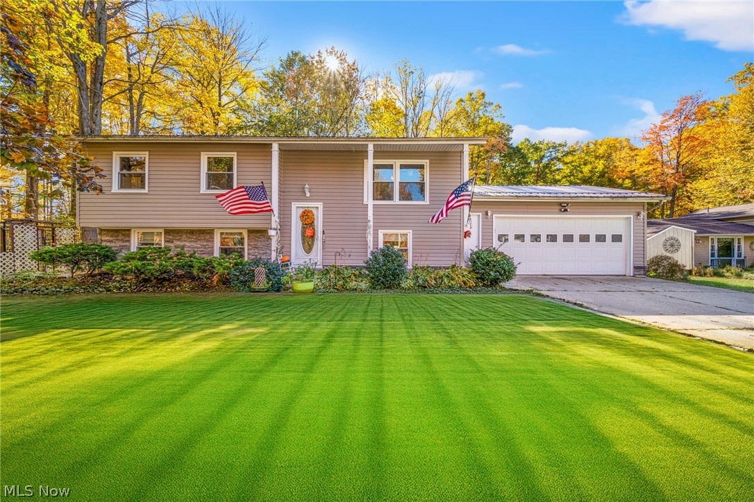 Welcome to this split-level home on a .53 acres lot located on a quiet cul-de-sac in North Kingsville, Ohio - offering a balance of privacy, functionality, and convenient access to everyday amenities. Situated just minutes from Lake Erie shoreline access, local parks, and shopping, this property delivers both comfort and location. This home features 4 bedrooms and 2 full bathrooms, providing flexible living space suitable for a variety of lifestyles. The updated kitchen is designed for both daily living and entertaining, complete with stainless steel appliances, ample counter space, and an efficient layout that supports ease of use. A standout feature is the bright three-season room with a gas fireplace, creating an inviting space to relax while enjoying views of the surrounding property through multiple seasons. Recent updates includes newer siding, updated windows, a whole-house generator, and a newer hot water tank offering added peace of mind for future ownership. The outdoor space features garden beds, a decorative water feature, and a spacious deck ideal for outdoor dining or gathering. Additional exterior highlights include a gazebo, dedicated workshop with pellet stove hookup, and a newer storage shed, providing versatile options for hobbies, storage, or creative use. A fenced area adds flexibility for a variety of outdoor activities or a safe space for your pets.
This property presents an opportunity to enjoy a well-cared-for home in a desirable North Kingsville location with convenient access to recreation, nature, and essential services.