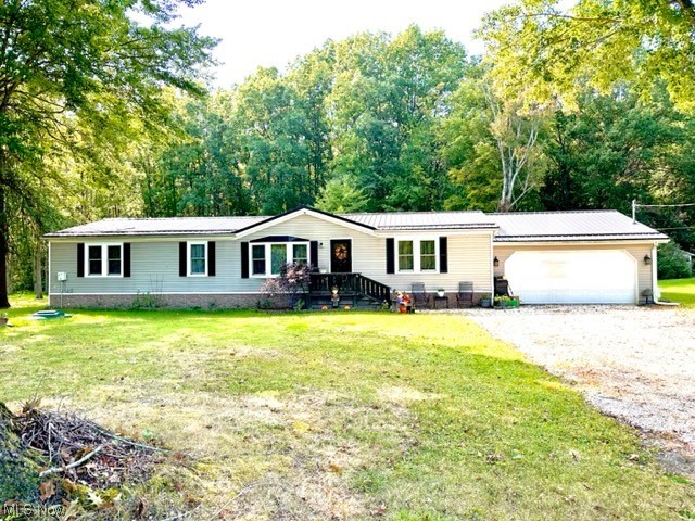 Serene country living at its finest  sitting on over a half acre in this large three bedroom, two full bath updated modular home Ranch with 1792 sq. feet.  Open floor plan, natural light, granite countertops and attached two car garage. Septic system is two years old!!!!Plenty of storage and large closets throughout. 
2022-Washer, Dryer, Hot water tank and Range.  2021-Roof and windows. 2020-Refridgerator, Microwave and Dishwasher.