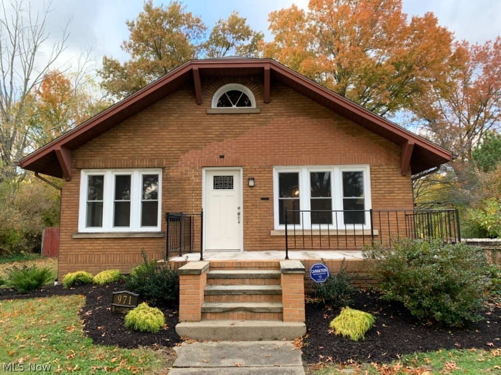 Adorable bungalow in the heart of Alliance! Move in Ready home offers beautiful kitchen with pull out cabinet drawers. Family room with built in bookshelves and gas fireplace, dining room has cozy window seat. Oversized covered deck overlooks private lot. Updates include electrical, appliances, furnace, windows, paint and all new flooring throughout. A must see!