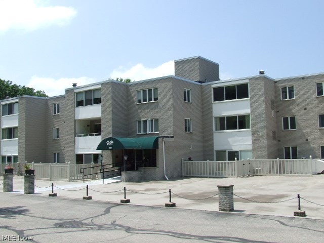 Great 2 bedroom, 2 full bath Condo in Whispering Heights Condominiums.  All new carpeting in the large living room with dining room area, and both bedrooms.  Kitchen with eating area has all appliances. Unit laundry room with washer and dryer.  Master bedroom has walk-in closet, 2nd bedroom has double closets plus linen closet and big coat closet.  This unit has an enclosed balcony with slider and screen.  Hot water tank is 1 year old.  Monthly fee includes all utilities except water/sewer.  This unit is the closest to the indoor parking garage and includes one parking space.  On the same floor as this unit is a laundry room, social room with kitchen available for rent, a library/pool table room, and exercise room.  Unit has additional storage on 1st floor.  There is also a parlor and the mail room on the 3rd/entry floor.  In addition, there is an outdoor, inground pool.  What are you waiting for... make your appointment today!!!