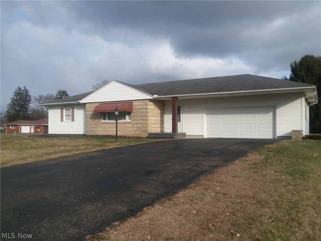 Downsize without sacrifice in this clean, move-in ready, 2 bedroom, 1 bath north-end ranch. A spacious L-shaped living and dining area offers space for entertaining, and includes immediate access to the family room with wood  burning fireplace and exit to the patio outside. Both bedrooms offer spacious double closets with one being a cedar closet for winter storage. Hardwood floors are under newer bedroom carpeting. Built-ins provide ample storage for linens and towels. A large kitchen replacement window offers light and pleasant views to the backyard. A newer vinyl kitchen floor was recently installed. The full basement features a recreational room with retro bar and bar stools for entertainment and separate section with washer and dryer, two sump pumps with new motors,gas  furnace, hot-water tank and additional storage. Features in the carpeted, two-car garage, include electric door opener, and multiple storage areas. 
You will appreciate the ideal location to all north-end activiti
