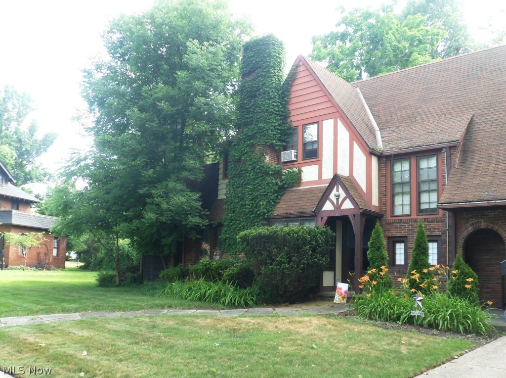 Garage and roof over back dormer replaced 10 years ago. Rest of roof was replaced in August 2014 with tear-off.  Wonderful traditional Tudor home located on a beautiful tree-lined street of similar homes. Located close to the Metro Parks. This home gives you the opportunity to preserve and enjoy the unique details offered in a classical Tudor from window seats, to the extra wide staircase and step-up formal dining room, the house is filled with original features from an era of majestic homes. It includes 3 bedroom, 1.5 baths, all appliances, updated electrical panel, central air and a two car garage. Shopping, public transportation, major highways, hospital, Tri-C, Library and city park, pool, tennis courts are nearby. There is a screened side porch, additional room with tiled floor off living room and deck.