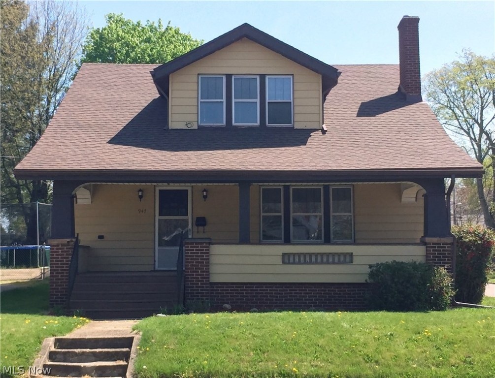 This newly remodeled 4 bedroom, 2 bath home is freshly painted throughout. A huge porch greets you out front. From the front door, you enter a large living room with carpeting, fireplace, oak built ins, oak trim, and oak crown molding. The dining room carries the carpeting, oak trim and crown molding theme through, and has a nice built in buffet.  A carpeted first floor bedroom could be the master; a full bath that has just been renovated is directly adjacent. Next to the bath is a first floor laundry area with hook ups. Down the hall you pass a built in butler's pantry with tons of storage. The hallway leads directly to the recently renovated kitchen complete with ceramic and glass tile backsplash and brushed stainless steel accessories. A ceramic tile floor carries through the entire kitchen, hall, laundry, and bath. Upstairs, refinished wood floors carry through the hallway and all three bedrooms. The newly renovated full bath features a porcelain wood look tile floor.  Built in lin