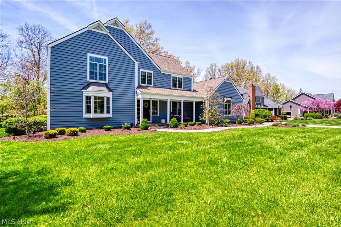 Welcome home! This wonderful lake front property nestled among the trees, with professionally landscaped grounds is sure to please! Large foyer with marble floors & curved staircase. Formal living with lots of natural light, formal dining large enough to hold all of your gatherings. Additional flex room on the 1st floor could bean an office, den, play room or whatever your needs may be! The family room with fireplace & sliders leads to a beautiful patio and fenced back yard with views of the lake. Large gourmet kitchen with newer appliances will surely please the cook! The sitting room or eat in kitchen area is great place for a beverage or cozy up with a book. Laundry/drop zone room, 1/2 bath and 2 car garage round out the 1st floor. Most flooring is hardwood. Upstairs the owners suite has a balcony overlooking back yard and three more nice sized bedrooms await you. Finished lower level with more useable space features game room, craft area, movie room and storage room! Outdoor fire p
