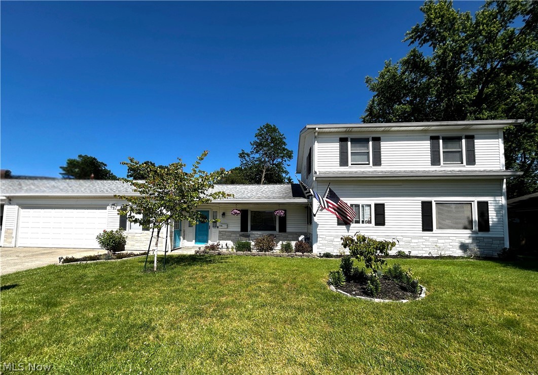 Welcome home to this beautifully maintained 4-bedroom, 2-bath Colonial offering the perfect blend of timeless charm, modern updates, and room to make it your own! From the moment you arrive, you'll appreciate the inviting curb appeal and pride of ownership that shines throughout.

Inside, you'll find spacious living areas, thoughtful updates, and a functional floor plan designed for everyday living and entertaining. Major improvements have already been completed, giving you peace of mind for years to come. Recent updates include a new furnace (2025), water heater (2026), garage door motor (2026), garage door (2023), lower roof (2020), lower gutters (2021), updated electrical service from the house to the curb (2024), gutter covers (2024) with a pass through garage leading straight to the backyard, renovated bathrooms, fresh paint throughout the lower level (2022-2026), new stove (2022), and patio door (2018).

Step outside to a generously sized city lot filled with endless possibilities. Whether you dream of adding a patio, fire pit, garden, pool, or creating the ultimate outdoor entertaining space, this backyard is ready for your vision. As an added bonus, enjoy the convenience and beauty of multiple mature fruit trees, providing fresh seasonal harvests right in your own backyard.

With the major updates already complete, all that's left to do is move in and make it your own. This is a rare opportunity to own a home that combines space, comfort, and long-term value in one incredible package.

Schedule your private showing today and discover everything this exceptional home has to offer!