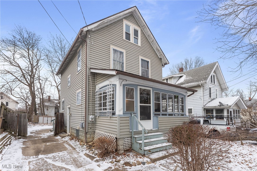 This charming century colonial showcases timeless character and craftsmanship throughout, highlighted by stunning original woodwork and thoughtful architectural details. The dining room features beautiful built-ins with a classic bench and it flows seamlessly into the family room, creating a warm and inviting layout ideal for everyday living and entertaining. An enclosed front porch adds additional space to enjoy your morning coffee in the warmer months. Upstairs, three spacious bedrooms are complete with a full bath. On the third-floor you have a large open room with electric baseboard heat, offering valuable additional space. Outdoors, enjoy a fully fenced backyard with ample room for a variety of uses. Purchased just in 2025, a large window A/C unit will remain with the home. A wonderful opportunity to own a home rich in history and charm.