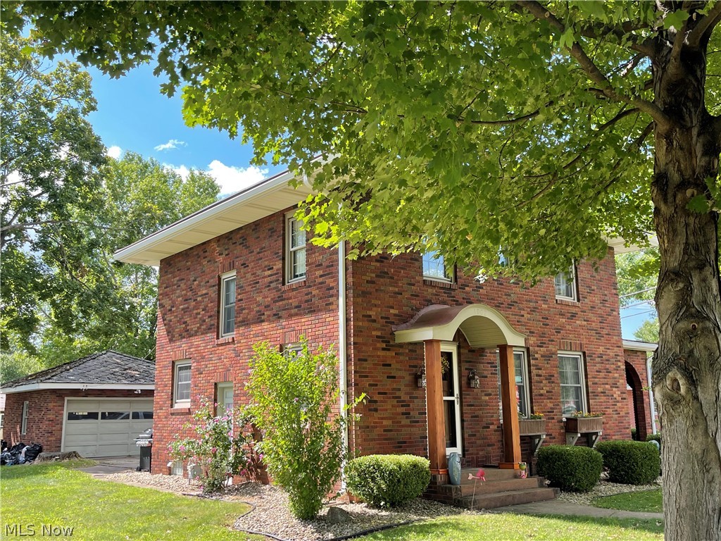 Beautiful brick 2 story home located in New Philadelphia South side!  Move right into this 3-4 bedroom, 2 1/2 bath, 2 car garage home!  Large updated kitchen with lots of counter space, tons of storage, ceramic tile floors and corner coffee bar!  Dining room has wood flooring, built in corner hutch and French doors leading to huge side porch.  Large living room!  Upstairs features 3 bedrooms and 2 full baths plus a walk up attic for plenty of storage!  Partially finished basement features a family room, laundry room and 4th bedroom/office.  All this on a large corner lot with 2 car garage and storage shed.  All nicely landscaped too!  Wont last long!