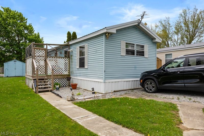 Affordable , one floor living in Hidden Acres Mobile Home Park;  This well maintained home offers an eat in kitchen with plenty of cupboards and counter space, bar area in living room with built-in cupboards, 2 ample size bedrooms with ceiling fans, with the master bedroom having access to the large bathroom, which also houses the laundry area; 
All appliances stay with the home, including washer and dryer;  Outside  has 2 newer porches, newer skirting on the home, and an outdoor shed;  Lot rent of $425 monthly includes water, sewer, trash, play area, lake, and seasonal  swimming pool;  Schedule your private viewing today !