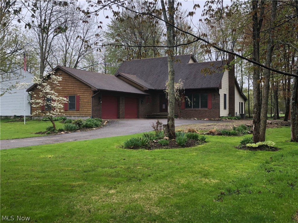 Country setting in Jefferson Village!!!  This well built home has well crafted woodworking throughout... you are amazed as soon as you walk in and see the foyer staircase overlooking the big great room with high cathedral ceilings and woodburner with full floor to ceiling brick wall. The woodburner is great on the snowy Jefferson nights to keep everyone cozy and heat up the whole house and keep those bills very efficient. This great room has plenty of room to relax after dinner or entertain with room for an extra dining area off of your big eat in kitchen with tons of counterspace  and cabinets for storage (all appliances stay). Step down to your own office space or extra sunroom that walks out to nice size deck with pad and electric all ready for hot tub. Nice wooded setting in this  back yard with no neighbors behind you just right for those family picnics and camp outs. Nice paved drive and extra stone drive extension for camper or big RV. Master bedroom  and master bath with linen