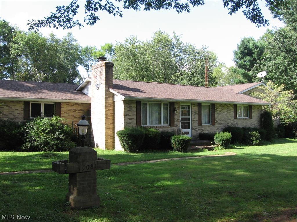 This wonderful all brick home offers; applianced kitchen, 1st floor laundry, 2 bedrooms, with bonus room, excellent for nursery, office, or possible 3rd bedroom.  2 full baths, one is on 1st floor with 2 entrances, 2nd is attached to master bedroom, both have double sinks.  3 season Florida room fully done in cedar offers a full wall of windows & sliding patio door leading to 12 x 24 covered deck.  Bay window in dining room offers excellent views of abundant wildlife.  2 car attached garage with water, electric, floor drain, garage door opener.  Roof was replaced in 2011 with life-time shingles.  Basement was water proofed in 2013 with life-time transferable warranty.  All window treatments stay.  This property also offers a huge 24 x 32 pole barn with an over sized door & double man doors.  Was formally used for semi tractor parking, it offers many uses, R.V. parking, multiple vehicle parking, or just a mechanics dream garage with electric, including 200 volt, fluorescent lighting, fl