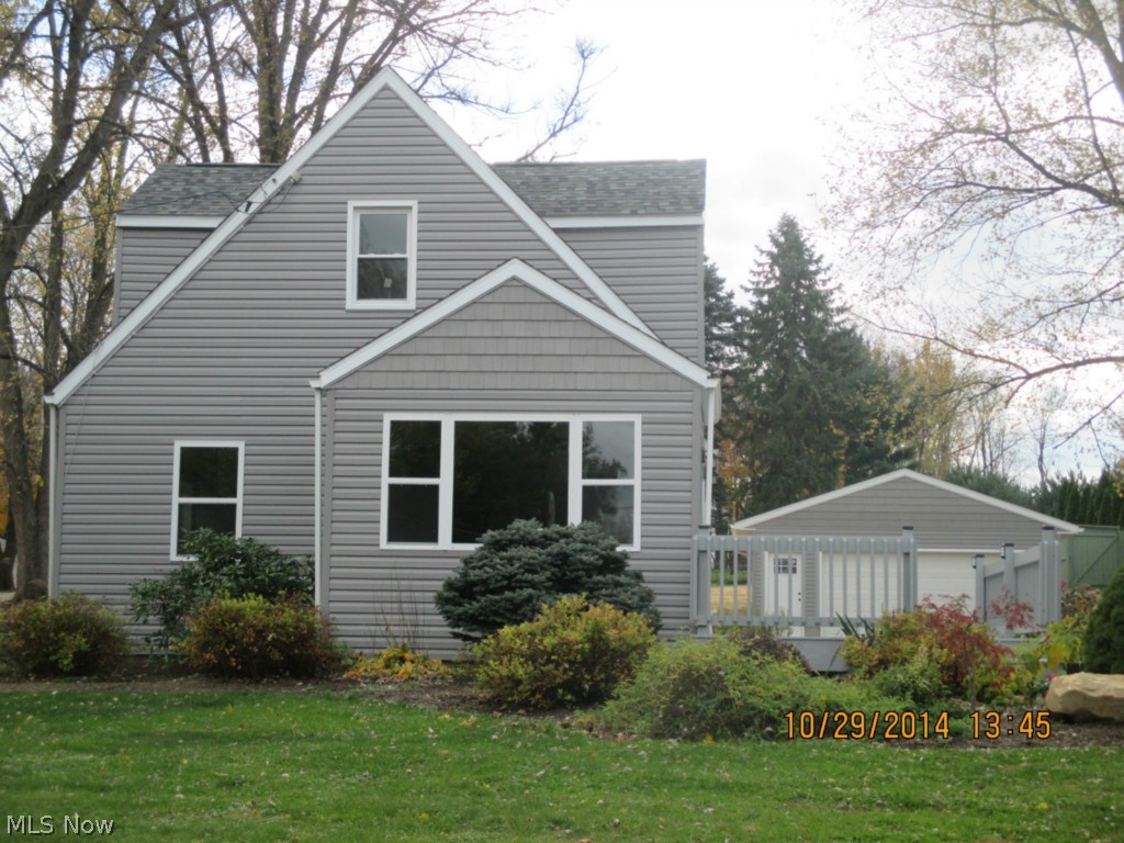 Beautifully Remodeled Cape with Over a Half Acre Corner Parcel!! First Floor Master Suite with Bath, New Open Floor Plan Features Fresh Paint Throughout, All NEW Carpeting, Refinished Hardwood Flooring in Living Room and Dining Area, Gorgeous Kitchen with New Cabinets, Granite Counters, Breakfast Bar, and New SST Dishwasher and Microwave! Second Floor with New Full Bath, Built In Storage in Bonus Area could be used for Sewing or Craft Room, Huge Closets and Two Large Bedrooms. New Siding, Roof, Windows, Furnace, HWT, a Finished Walk Out Family Room. Laundry Room, Utility Room, and More Storage in the Lower Level. If that is not enough, did I mention the brand NEW 2 Car Detached Garage, Rear Entry with Mud Room, Mature Landscape, Custom Brick Patio, and Deck! This is a Fantastic Opportunity for any buyer! Nothing to do, just Move In and enjoy your Custom "New" Home! Great Location, near Schools, Portage Lakes Parks, Recreation, Shopping, Nite Life, and ALL Local amenities are just​​‌​​​​‌​‌​​​‌‌​​​‌‌‌​​‌​​‌‌​​​​ minut