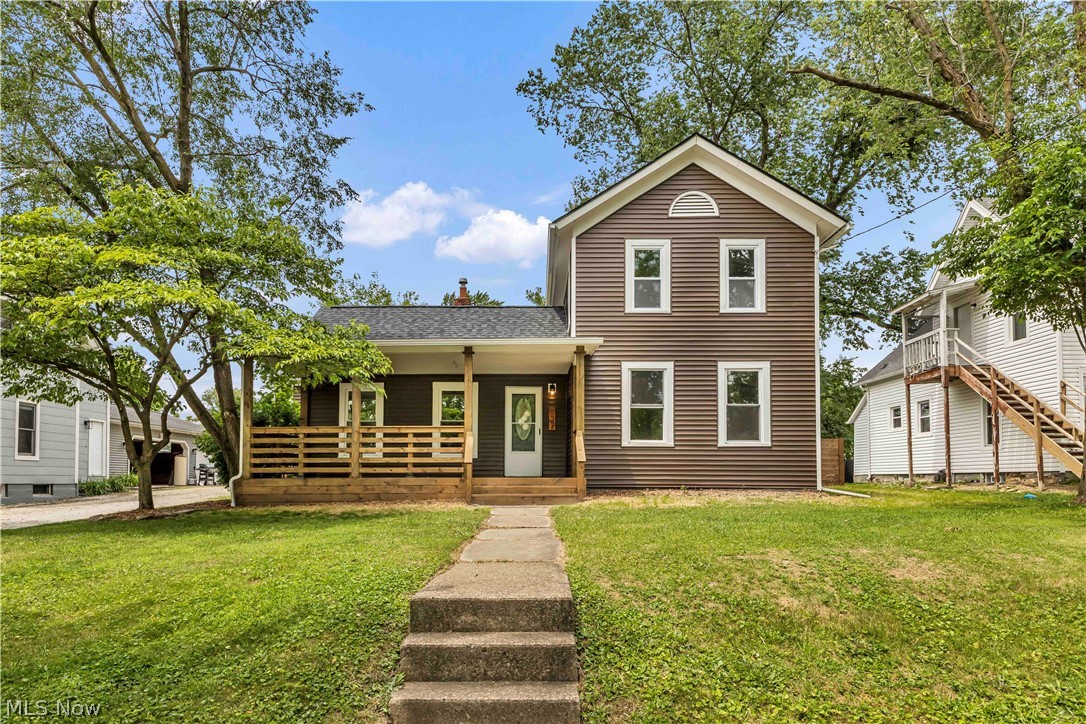Pulling up to 137 N. Vine, the first thing you'll notice is the inviting covered front porch. It gives the home a warm feel and adds so much character and curb appeal. You can easily picture yourself sitting out front with a cup of coffee in the morning or catching up with neighbors on a summer evening.

Inside, the home has been completely remodeled and has a bright, comfortable feel from room to room. The living room is a great space to relax and unwind, and the new laminate flooring ties everything together nicely. It feels fresh without losing the charm that makes a house feel like home.

The kitchen really turned out beautifully. With modern cabinets, granite countertops, and a tiled backsplash, it's the kind of space where meals are made, conversations happen, and everyone naturally gathers. There's plenty of room to spread out whether you're cooking dinner for two or entertaining family and friends.

Two bedrooms and a brand-new full bath are conveniently located on the first floor, making everyday living easy. Upstairs, you'll find a huge owner's suite that feels like its own private retreat. The spacious bedroom offers plenty of room for a sitting area, and the large bathroom gives you the comfort and privacy you'd expect in a home like this.

AK Management didn't just focus on cosmetics. Major improvements include a brand-new roof and a new HVAC system, giving the next owner peace of mind and helping make this home truly move-in ready.

Out back, there's room to enjoy the yard, work on projects, or simply relax. The large shed provides plenty of extra storage and helps keep everything organized.

One of the things people love most about this location is being so close to Historic Medina Square. Whether it's dinner with friends, grabbing coffee, summer concerts, the farmers market, or the holiday festivities that make Medina famous, you'll appreciate having one of Northeast Ohio's most charming downtowns just minutes away.
