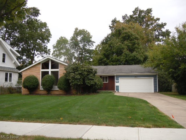 Beautiful Ranch On Picturesque Lot Near Everything In Berea ~ Shops, Restaurants, Library and Coe Lake! Great Location! Huge Family Sized Kitchen. Dining Area Includes Built-In China Cabinet and Opens Out To Sunroom. The Comfortable Living Room Features Beautiful Woodburner and Built-In Shelves. All the Bedrooms Feature Hardwood Floors. Bedroom One Offers Lots Of Bookshelves and Could Make A Great Office. The Master Bedroom and Bedroom Two Features Floor To Ceiling Windows. The Basement Has A Rec Room and Dry Bar. This Is A Great Place To Call Home!