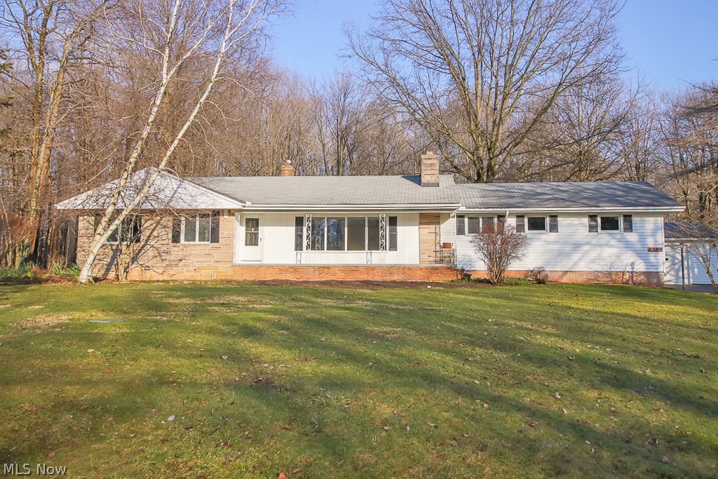 What is on your list of must haves?  This Orange Village ranch style home is going to check off many of those items.  Set on a quiet street on a large lot with a wooded rear yard and plenty of space for outdoor living and activities.  There is an extra detached garage for those needing the extra storage space or maybe the car enthusiast who needs a spot for that extra special piece of the collection.  There's a workshop in the finished basement for anyone who's looking for space to work on whatever your heart can imagine.  There's even extra electrical for large pieces of equipment.  1st floor laundry, that extra full bath and bedroom plus the home is ready for occupancy.  You'll need to act fast if you're looking in this area, at this price it won't last very long.