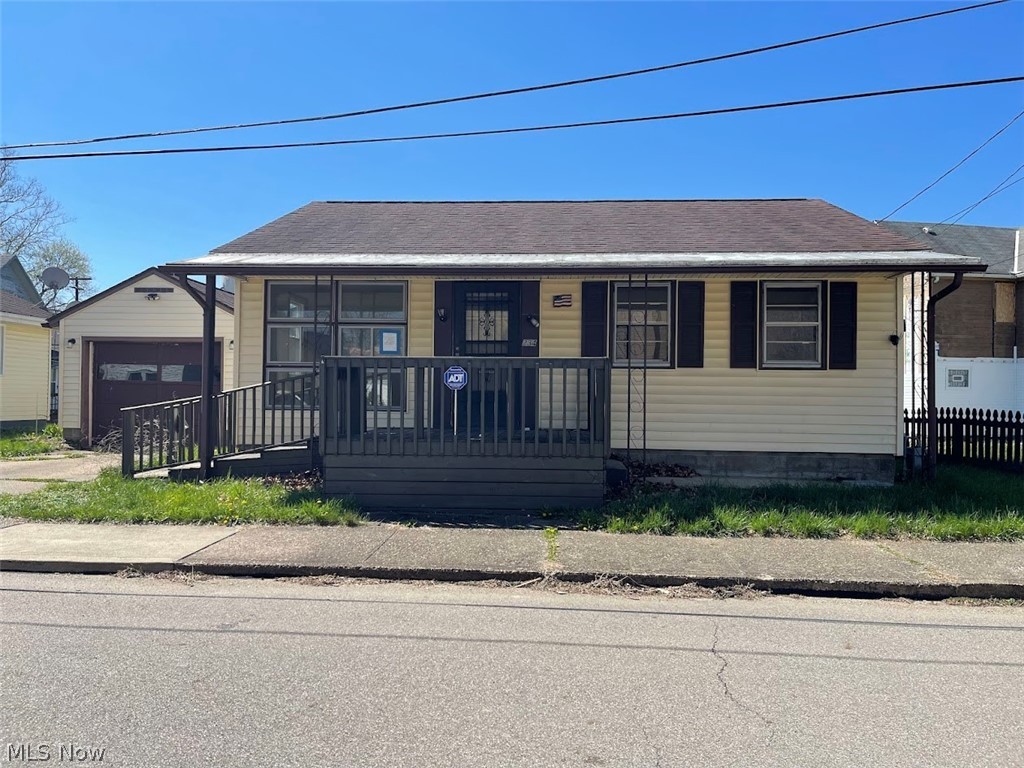 2 bedroom 1 bath property with an attached 1 car garage and a large enclosed back porch for additional living space. Full basement that could also be finished for additional living space. Call your Realtor for a showing. 'This property is being sold as-is, property is lender-owned and US Bank is making no representations or warranties'