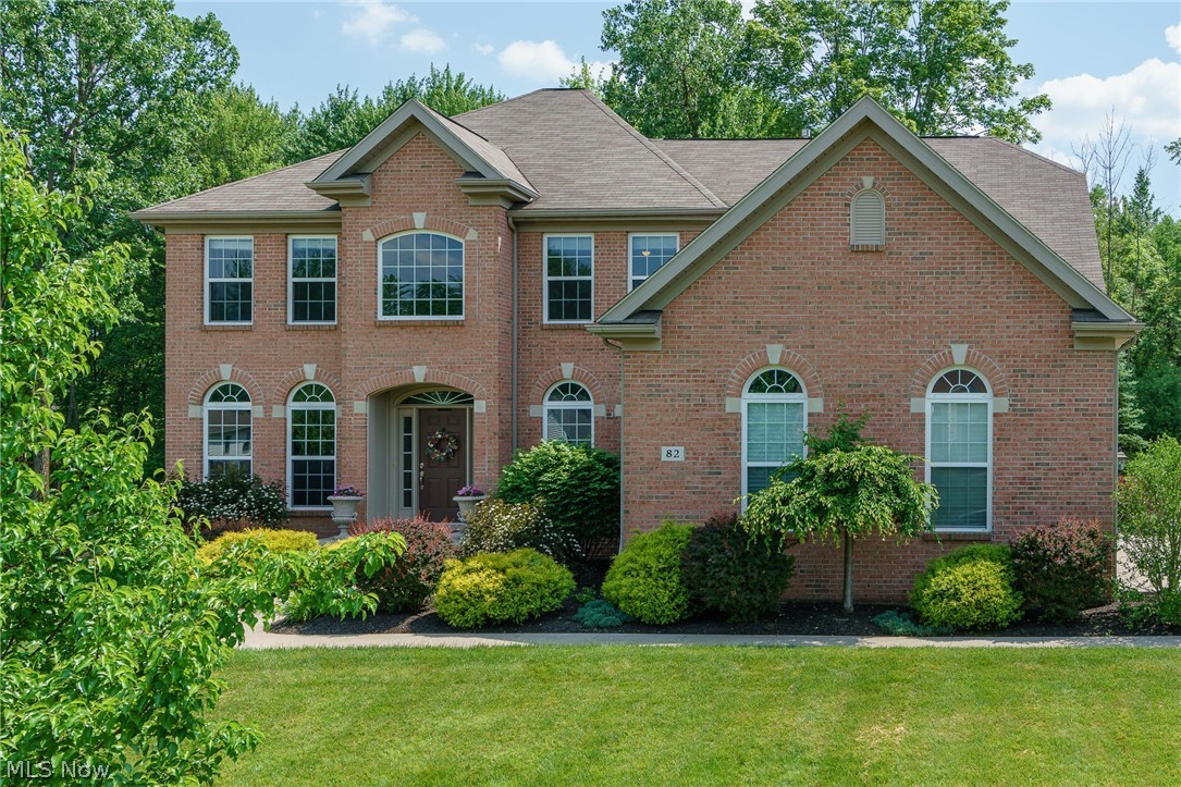 Stunning Brick custom built Drees home in prestigious Stonegate Development. Two-Story Hrdwd Flr. foyer with extensive molding and columns as you enter the formal DR and LR. Cherry Kitchen with granite, SS appliances., Hrdwd Floors, and large center island. Convenient Butlers Pantry offers lots of cabinetry and accented with beautiful granite located between DR and Kitchen. Family Room with soaring ceiling and wall of windows plus a custom crafted Gas Fireplace. Spacious Vaulted Master Suite with double door entry and spa-like Master Bath with glass/tiled shower, soaking tub, double sinks and wonderful Walk-In Closet with built-in drawers and storage. Step up to the large Bonus Room, makes a great second family room/playroom, or 5th bedroom. Three more bedrooms and a full bath with double sinks complete the second floor. Newly finished designer Lower Level boasts Kitchen/Bar areas with gorgeous cabinetry, granite counters, dishwasher, sink, and 2 counter, glass door, beverage refrigera