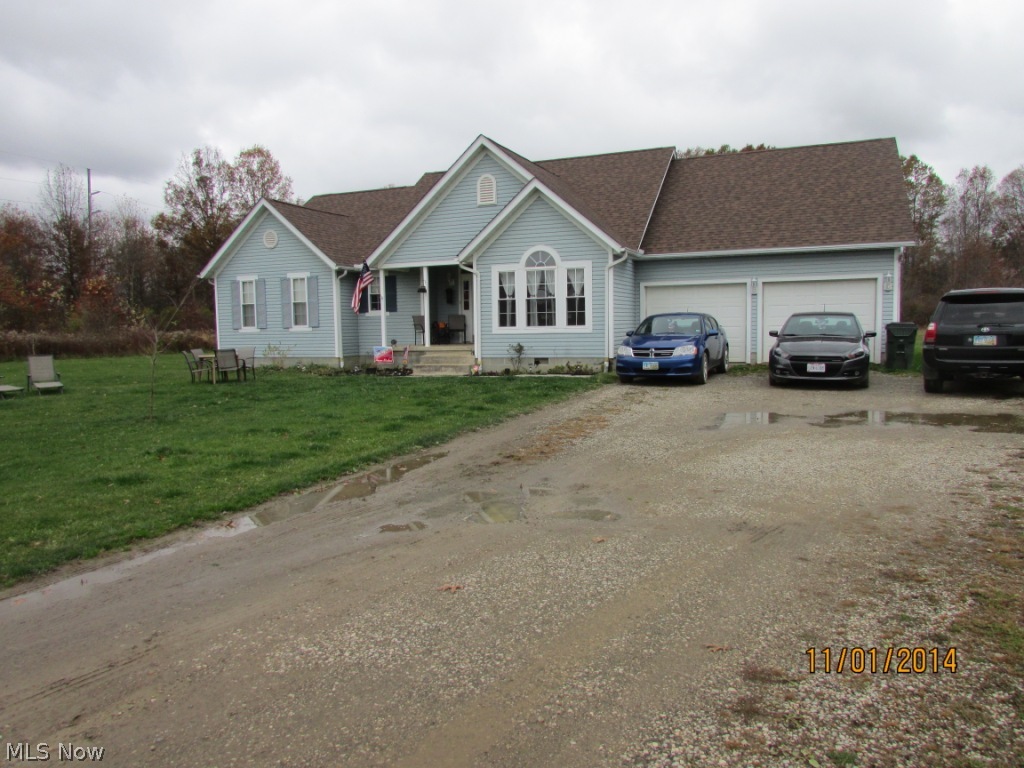 Country-feel but public amenities!  Beautiful split ranch w/vaulted ceiling in spacious living room with propane FP, dinette leading to rear covered porch, formal dining room, large master bedroom w/2 walk-in closets and double vanity in master bath.  Also home office!  Large attached 2 car garage AND 24x36 extra garage!  Heat pump & roof are 2 years old!  Large flat lot at almost an acre.   Everything on one floor!
