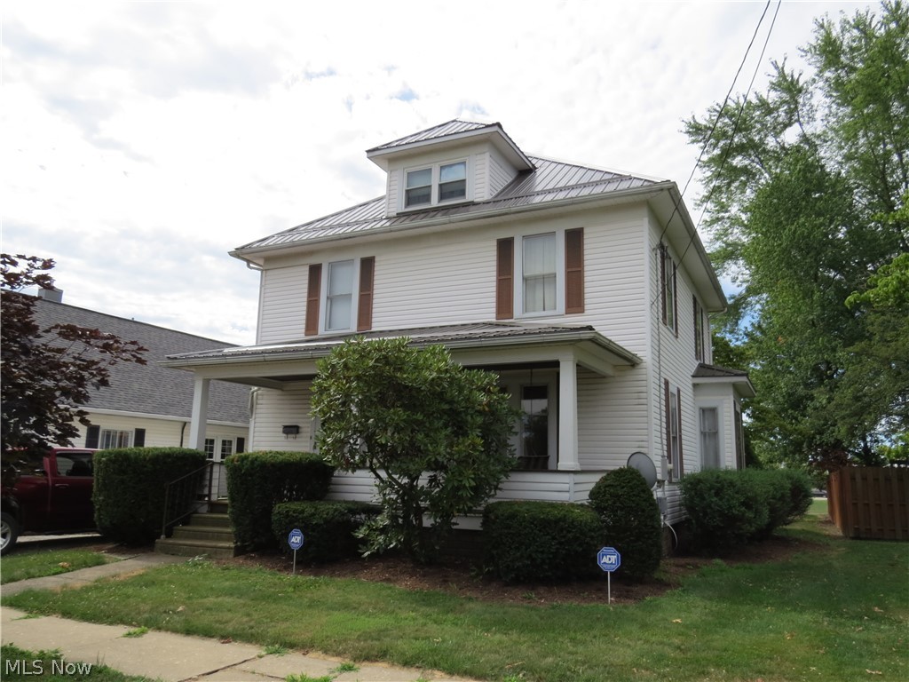 Great 2 Story 4 Bedroom Home in Carrollton! Here's a big house with 4 bedrooms located near the elementary school. Home features a bath on each level, new metal roofs on the house and 2 car detached garage in 2019, nice oak kitchen, large rooms, fancy woodwork, built in leaded glass bookcases, pocket library doors, window seat, etc. You' spend time on the covered front porch swing or on the rear deck. There's plenty of storage with a walk-up-to attic and full basement. This house has character and awaits new owners to add their personal touch. The location is within walking distances to school, the library, parks, etc. The annual taxes without the Homestead Reduction would be $1435.88. Call to view this wonderful home!