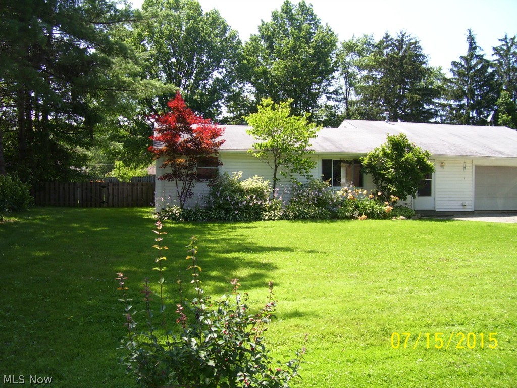 Cute 3 bedroom  ranch with slding doors in formal dining room and master bedroom.  Out building wth carport. Home has just been redone with new kitchen floor.  Spacious kitchen for the cook of the home.