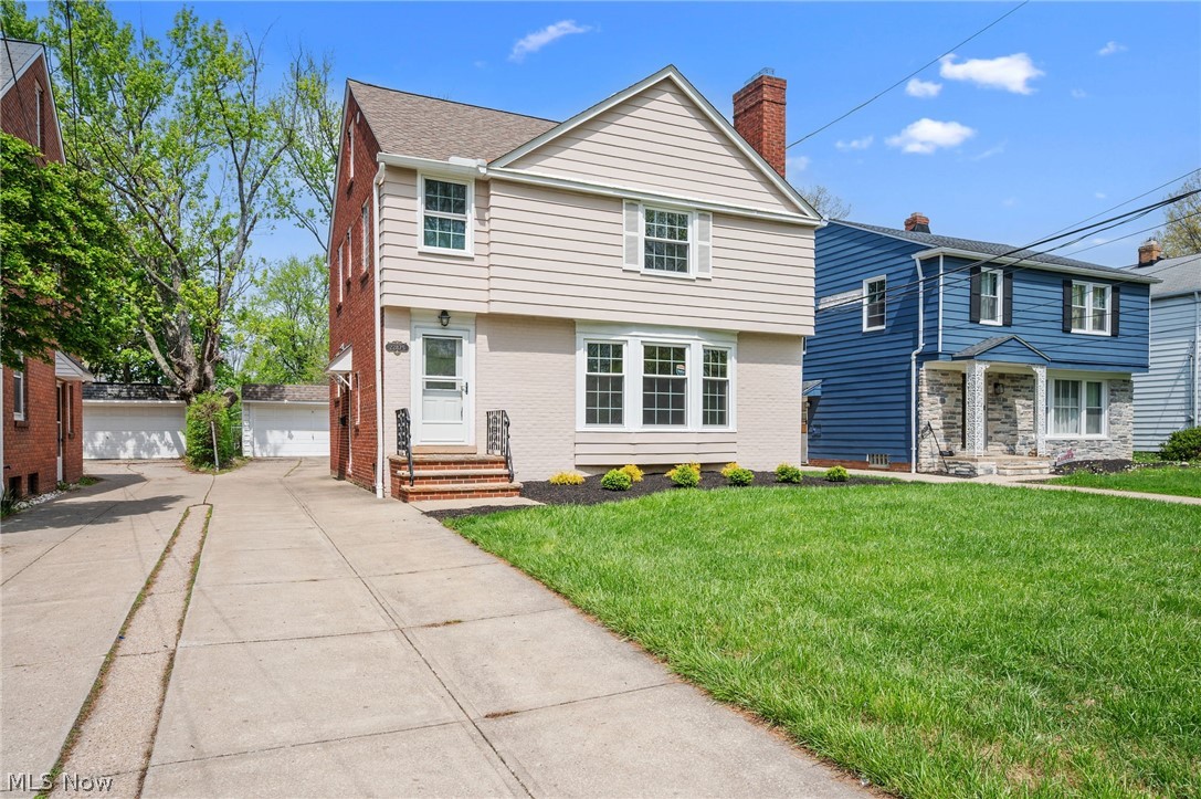 Fully renovated and ready to impress, this 4-bed, 3.5-bath Shaker Heights home is the one you've been waiting for. Prime location on the border of Shaker Heights and University Heights featuring beautiful new landscaping. Fully refinished hardwood floors and recessed lighting flow throughout all 2,080 square feet (and that’s not counting the basement!). The chef's kitchen features quartz counters, solid wood cabinets, center island, dual sinks, and two dishwashers — built for the way people actually live. The transformed bathrooms are a standout: a 2nd floor spa-inspired full bath with tub, glass block window, and backlit LED mirror; ensuite sleek second full bath with subway tile shower; a third full bath with tub in the private upper suite; and a chic half bath with  warm wood shelving on the first level. A dramatic spiral staircase leads to a stunning vaulted upper-level suite — your own private retreat. The refinished basement includes recessed lighting and a sleek epoxy floor laundry/systems area. Out back, a large deck is ready for summer entertaining, overlooking a generous, open yard with plenty of room to spread out. Renovated top to bottom including replacement thermal windows, and alarm system. Nothing to do but move in and start living.