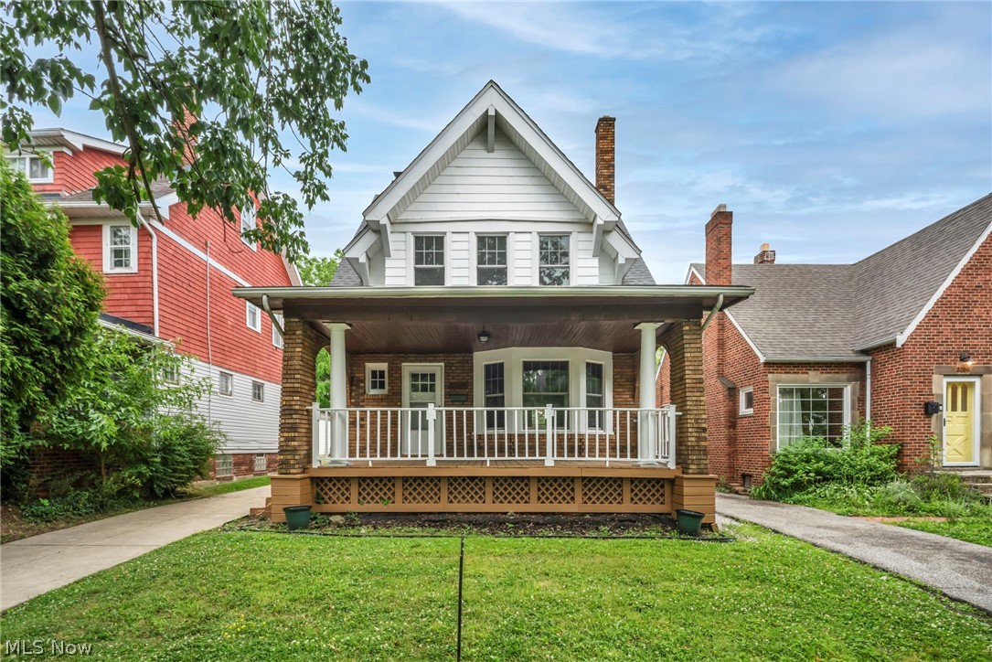 Welcome to this stunning, fully renovated Colonial nestled in one of Cleveland Heights' most sought-after neighborhoods, just around the corner from the iconic Cedar Lee District and within walking distance of vibrant Coventry Village's shops, restaurants, and entertainment.

Thoughtfully updated from top to bottom with exceptional attention to detail, this 4-bedroom, 1.5-bath home seamlessly blends timeless character with modern luxury. The main floor showcases gorgeous original leaded glass windows that flood the spacious living and dining rooms with natural light while preserving the home's historic charm, while the rest of the home has been updated with 19 brand new high end argon gas filled windows. Throughout the home, you'll find brand-new luxury vinyl plank flooring, creating a cohesive and sophisticated aesthetic.

The completely redesigned kitchen is a showstopper, featuring soft-close shaker cabinetry, elegant white quartz countertops, a classic subway tile backsplash, and brand-new stainless steel appliances. Every finish has been carefully selected to create a bright, modern space perfect for everyday living and entertaining.

Upstairs, the beautifully renovated full bath features an on-trend vertical subway tile shower surround, while a charming sunroom connected to one of the second-floor bedrooms offers the perfect space for a home office, reading nook, or private retreat. A spacious fourth bedroom on the third floor provides flexibility for guests, a playroom, or additional living space.

Outside, enjoy relaxing mornings on the inviting front porch or entertain friends and family on the rear deck overlooking the backyard. Completing the property is a spacious two-car garage equipped with a convenient automatic garage door opener.

With its unbeatable location, meticulous renovations, preserved architectural details, and move-in-ready condition, this exceptional home offers the perfect combination of historic charm and contemporary living.