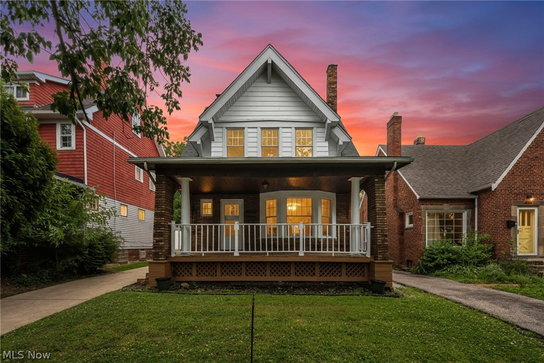 Welcome to this stunning, fully renovated Colonial nestled in one of Cleveland Heights' most sought-after neighborhoods, just around the corner from the iconic Cedar Lee District and within walking distance of vibrant Coventry Village's shops, restaurants, and entertainment.

Thoughtfully updated from top to bottom with exceptional attention to detail, this 4-bedroom, 1.5-bath home seamlessly blends timeless character with modern luxury. The main floor showcases gorgeous original leaded glass windows that flood the spacious living and dining rooms with natural light while preserving the home's historic charm, while the rest of the home has been updated with 19 brand new high end argon gas filled windows. Throughout the home, you'll find brand-new luxury vinyl plank flooring, creating a cohesive and sophisticated aesthetic.

The completely redesigned kitchen is a showstopper, featuring soft-close shaker cabinetry, elegant white quartz countertops, a classic subway tile backsplash, and brand-new stainless steel appliances. Every finish has been carefully selected to create a bright, modern space perfect for everyday living and entertaining.

Upstairs, the beautifully renovated full bath features an on-trend vertical subway tile shower surround, while a charming sunroom connected to one of the second-floor bedrooms offers the perfect space for a home office, reading nook, or private retreat. A spacious fourth bedroom on the third floor provides flexibility for guests, a playroom, or additional living space.

Outside, enjoy relaxing mornings on the inviting front porch or entertain friends and family on the rear deck overlooking the backyard. Completing the property is a spacious two-car garage equipped with a convenient automatic garage door opener.

With its unbeatable location, meticulous renovations, preserved architectural details, and move-in-ready condition, this exceptional home offers the perfect combination of historic charm and contemporary living.