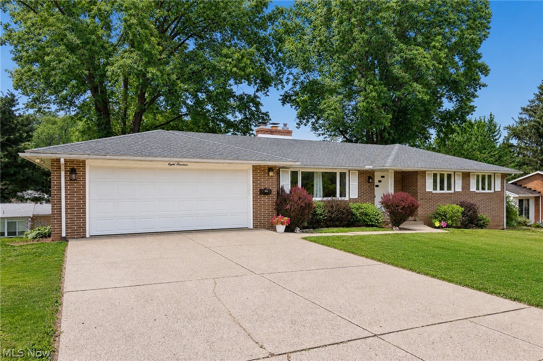 :  Welcome home to this beautifully maintained 3-bedroom, 3.5-bath brick ranch offering generous living space, thoughtful updates, and exceptional functionality. From the moment you step inside, you'll appreciate the inviting layout featuring a spacious living room with a cozy fireplace, a formal dining room, and an eat-in kitchen complete with stunning quartz countertops and stainless steel appliances. The home features beautiful hardwood floors in all three bedrooms, adding warmth and timeless character. Convenience is key with a first-floor laundry room and a well-designed floor plan that offers comfortable everyday living. The expansive walkout lower level adds incredible versatility with approximately 1305 square feet of finished living space, including a massive family/recreation room with a second fireplace, a wet bar, a full bathroom, a bonus room perfect for a hobby or fitness area, a private office, and a mechanical room—ideal for entertaining, working from home, or accommodating guests. Major mechanicals have been meticulously maintained, including an HVAC system installed in 2019 that has been professionally serviced twice each year for added peace of mind. This exceptional home offers the perfect combination of space, comfort, and quality in a desirable location. Don't miss your opportunity to make this one your own—schedule your private showing today!