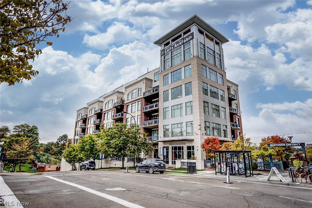Welcome to an exceptional residence in the sought-after Northside Lofts—where industrial character meets refined modern living. This stunning home is designed to impress with expansive city views, soaring ceilings, and thoughtfully curated finishes throughout.
The open-concept living space is flooded with natural light from oversized windows, perfectly framing downtown views. A standout feature is the functional garage-style door, creating a unique retractable wall for the bedroom—offering flexibility, style, and an unmistakable loft aesthetic. At the heart of the home, the chef’s kitchen is truly a showpiece. Outfitted with a professional-grade stove, sleek Cambria countertops, and a raised breakfast bar, it’s ideal for both everyday living and entertaining. A built-in wet bar adds an extra layer of convenience and sophistication. Both bedrooms are designed with comfort and storage in mind, each featuring its own spacious walk-in closet. The primary suite elevates relaxation with an en-suite den—perfect for a home office, lounge, or private retreat. The bathrooms deliver spa-like appeal, highlighted by a striking glass shower with views overlooking downtown—bringing a rare and luxurious experience into your daily routine. Additional features include modern designer lighting throughout, wiring for surround sound speakers, along with a cleverly designed hidden rolling closet door for a seamless look and a seamless blend of industrial textures and contemporary finishes that define the Northside Lofts lifestyle.
This is more than a home—it’s a statement space for those who appreciate design, functionality, and city living at its finest.