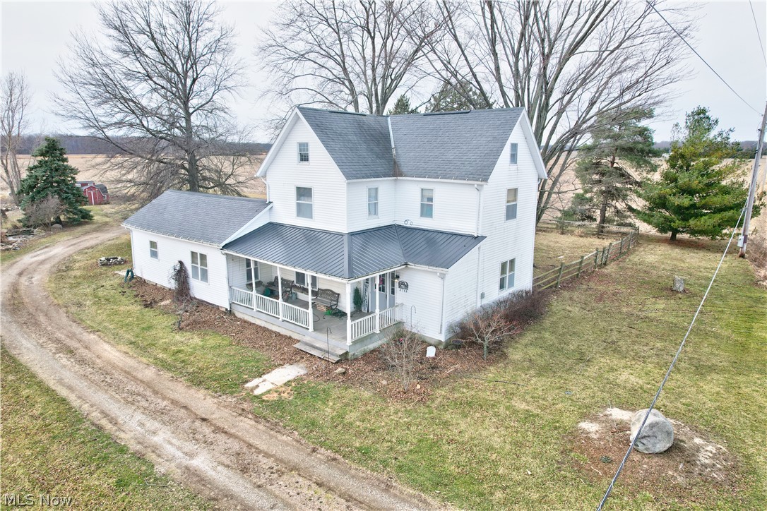 This is country living! Offering nearly total seclusion being surrounded by farm fields, this is a great place to have a big garden and some chickens. This century farm house is over 2600 sqft offering 4 bedrooms and 2 full bathrooms. Enormous eat-in kitchen with spacious living and dining rooms. Beautiful natural woodwork and built-ins. Floored walk-up attic is great for storage. Oversized garage is 2 cars deep on one side so it will fit 3 cars or 2 cars and all your lawn equipment. The spacious 1.29 acre lot has a fenced area with a chicken coop. Plenty of room to put a barn up or for your garden. Storage shed is approximately 16x12. Act on this opportunity before it passes you by.

Room sizes are approximate