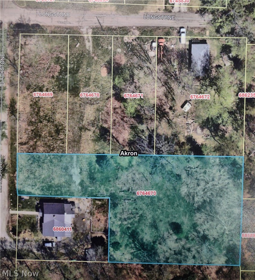 Vacant parcel for new home construction, featruing a hilltop setting and 15-year tax abatement on the improved value (new building).  This parcel allows for home construction on the front portion and a larger area for garden and/or recreation on the rear portion.  Buyer to verify details of the tax abatement, availability / cost of utilities and new construction requirements.