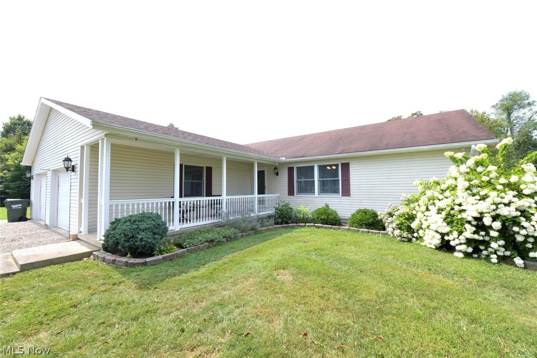 This remodeled ranch home with 2178 sq. ft. of living space on the main floor plus a finished lower level, offers 3 bedrooms  2 full baths , the large living room that flows to the kitchen and family room,  gas fireplace, open floor plan, new hardwood floors, first floor laundry, large deck with hot tub, 18.25  acres, 30 x 40 pole building