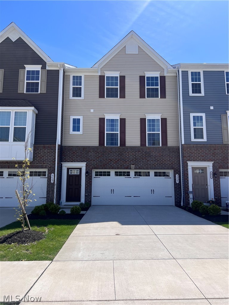Location Location Location! Built in 2022, the Wexford townhome with open concept floor plan is minutes away from
Rt. 8, allowing access to Downtown Akron in less than 10 minutes. Bright and open layout offers great room with plush
carpeting and view of vacant space; only house to have this privilege! There is a convenient half bath tucked away on
the main living level. Spacious kitchen boasts of an oversized island, LVP floors, stainless steel appliances, ample
counter space, cabinets and views of the conserved green space. A spacious dining or flex space is off the kitchen with
LVP floor. Primary suite is on the 2nd floor with walk-in closet and views of the greenery in the rear is both appealing
and provides privacy. Ensuite bath boasts dual vanity with cultured marble counters, LVP floors, walk-in shower with
dual shower heads. There are 2 other bedrooms and a full bath on 2nd floor. You will love the convenience of 2nd floor
laundry. Walkout basement is partially finished with option to add a half bathroom and wired for home theater. This
townhome offers spacious 2-car garage with access to both basement and foyer. Easy access to Blossom Music Center
and close to beautiful Cuyahoga Falls downtown and loads of recreation including Brookledge Golf Course and endless
activities in the 48,000 acres of Cuyahoga Valley National Park. Schedule an appointment before it is too late!