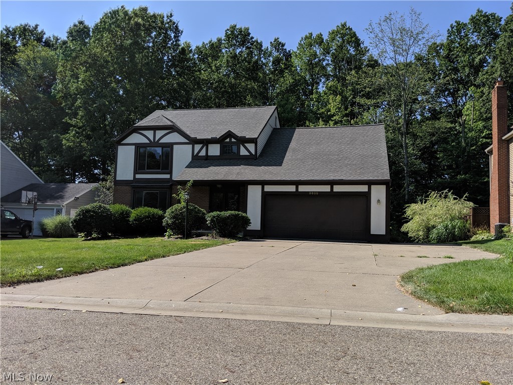 Beautiful Updated Home with Private Yard! You will love the large open and updated kitchen, Hardwood Floors throughout the first floor, Updated Baths, Large Sun Room that adjoins a large deck with plenty of trees for shade and privacy. This home also has an extra wide driveway for additional parking.