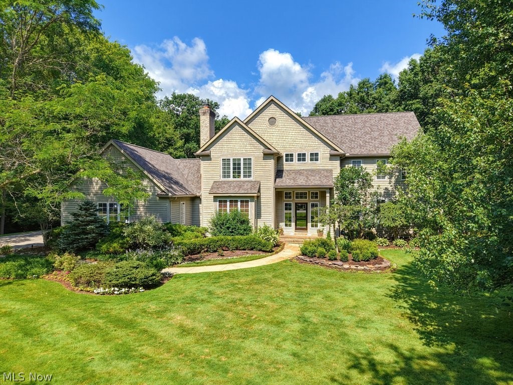 Spectacular and spacious updated custom built modern colonial on a 1.39 acre private setting highlighted by the grand inground pool and spa & pool house. Step inside the inviting 2 story entry with custom molding, trimwork & updated lighting throughout. Private office with built in bookcases & fireplace provides the perfect work at home space. The formal living room opens to the spacious dining room & leads to the 2021 updated gourmet kitchen complete with new appliances, Thermadore 8 burner range w steam /double oven, quartz counters, white cabinetry, new sinks, faucets & hardware. Sunroom with built in window seat & walls of windows and access to the gorgeous backyard. Grand great room with soaring ceilings, built-in cabinetry & gas fireplace. Back hallway complete with full bath, large laundry room &access to the 3 car garage.  2nd floor includes primary bedroom suite w fireplace, 2 walk-in closets & updated primary bath w heated floors, walk in shower, jacuzzi tub, 2 vanities w granite counters. 3 additional spacious bedrooms - Bed 2 w onsuite bath and Bed 3 & 4 w jack-n-jill bath. Lower level finished w 2 additional rooms (used as bedrooms), large rec room area, game room space, bar area, full steam shower bathroom, 500 bottle wine cellar & plenty of extra storage room. Walk out to the amazing backyard setting complete with inground pool, inground spa, pool house with new granite countertops, sink & faucet.  Other improvements include: 2025: new roof, 2 new hot water tanks, new main furnace and AC, new sump pump. Newer bedrooms & lower level carpeting; new faucets & plumbing in bathrooms, laundry, pool house; painting throughout the house.  Many extras include: security system & cameras, sprinklers, central vac, invisible fence, built-in surround sound, outdoor speakers & lighting. A very desirable neighborhood & excellent location with easy access to highways and short drive into Chagrin Falls. A tremendous home and property you will be proud to call your own.