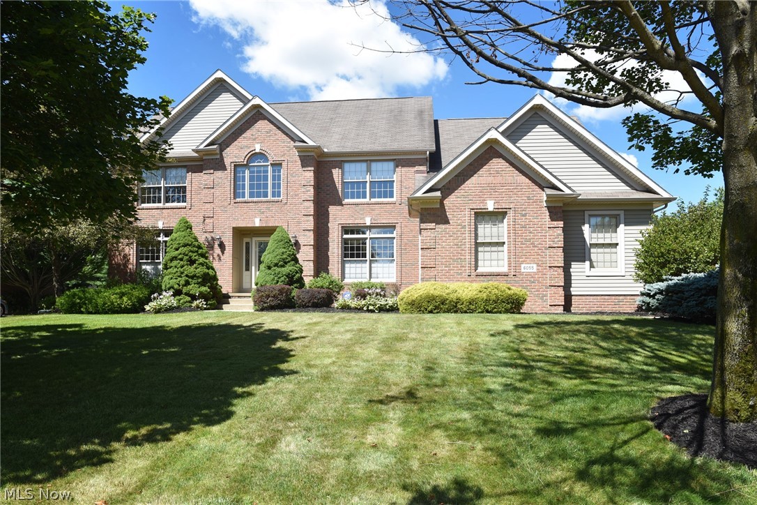 ** Seller to credit buyer $5,000 at closing with an acceptable purchase agreement/contract.** Stunning and immaculate one-owner home located in Carrington, Jackson Township. Custom built by Terrell Homes and featuring a cherry Bolon Kitchen and amazing cherry woodwork throughout including crown molding, dental molding, fluted columns, wainscoting, split staircase, 9’ ceilings and transom windows and openings. With over 3,500 square feet and 5 bedrooms, including a first-floor in-law suite with a full bathroom, you’ll find a room for everyone. Spacious kitchen with massive island and sitting bar is open to wonderful family room and bright sun room featuring cathedral ceiling and walls of windows that steps out to the deck overlooking the lush backyard. The second floor features an amazing master suite with cathedral ceiling, sitting room/office, walk-in closet with access from bedroom & bathroom, large double vanity, jet tub and private shower and commode space. Three additional large b