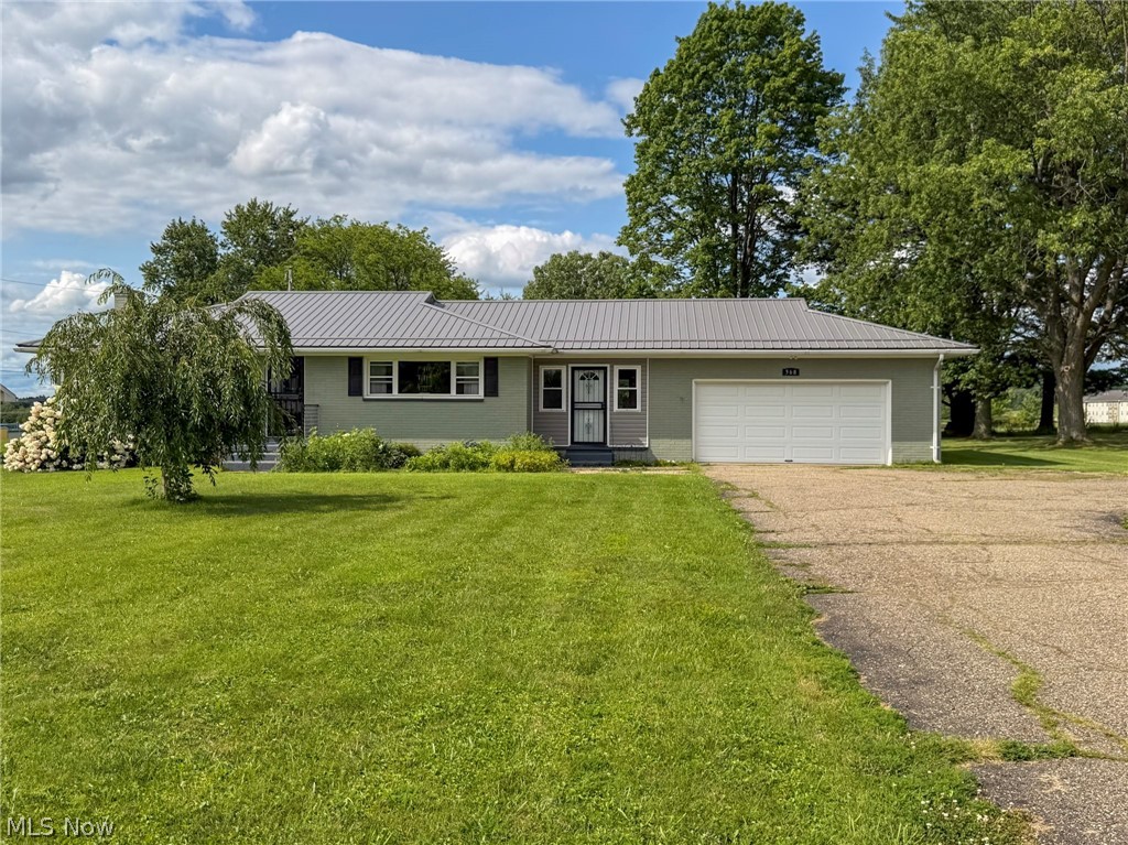 Welcome to 568 12th St. NW, Carrollton, OH 44615! This well-maintained 2-bedroom, 1-bath brick ranch offers the ease of one-floor living with tasteful updates throughout. Inside, you’ll find approximately 1,200 square feet of comfortable living space featuring luxury vinyl plank flooring, a spacious eat-in kitchen with newer appliances, and an updated bathroom with a walk-in shower and plenty of storage. The attached 2-car garage and breezeway add everyday convenience, while the large, level backyard provides the perfect space for entertaining, gardening, or simply relaxing. Enjoy summer evenings on the spacious back deck or unwind with your morning coffee on the covered front porch. A storage shed offers additional room for lawn equipment and outdoor essentials. Whether you’re a first-time homebuyer, looking to downsize, or searching for a move-in-ready home, this property is ready to welcome its next owner. Conveniently located near schools, shopping, dining, and other local amenities, this home offers the perfect combination of comfort, convenience, and small-town charm. Schedule your private showing today and see everything this Carrollton home has to offer!