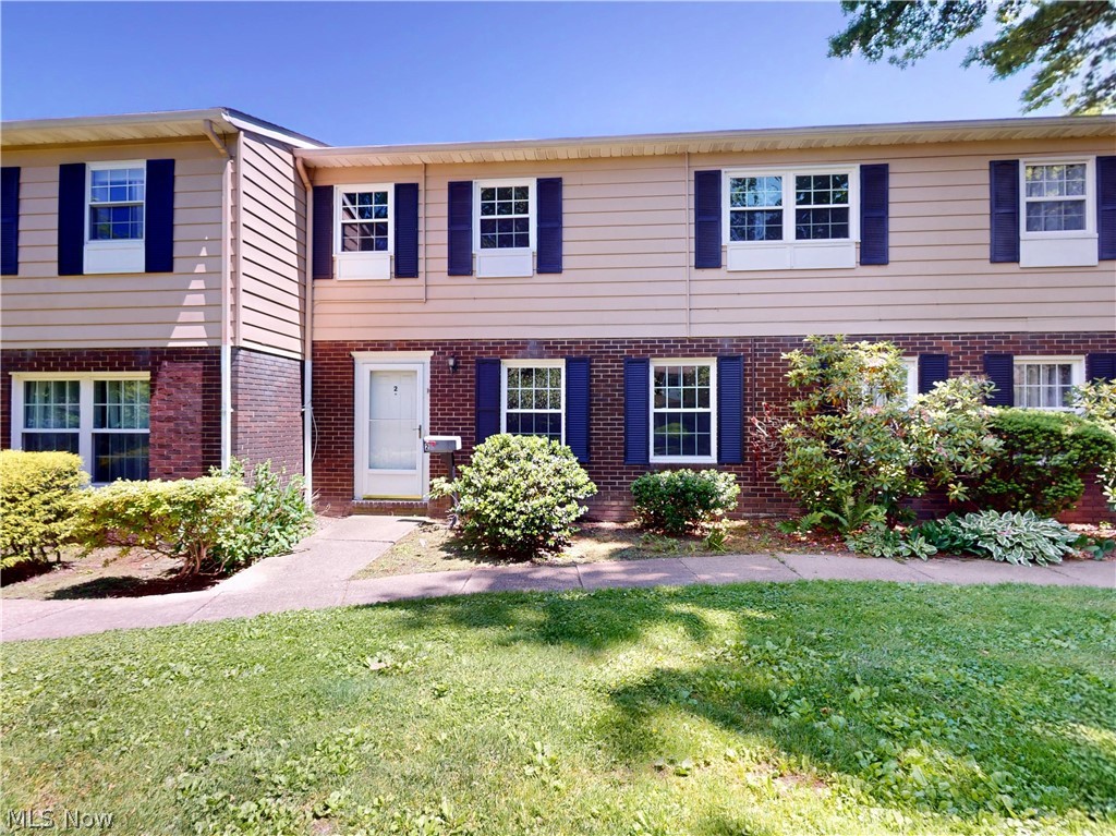Welcome home to this beautifully updated 3 bedroom 2.5 bath condo conveniently located across from Great Lakes Mall. The main level features a family room with a cozy fireplace and sliding glass doors that lead to a private patio. The kitchen offers vinyl flooring, abundant cabinetry, and brand new stainless steel appliances. The nice size living room and dining room have new carpet. A convenient half bath completes the main level. Upstairs, you'll find three bedrooms with brand new carpet throughout. The primary bedroom includes a private bath with newly updated shower, while and additional full bath serves the remaining bedrooms. Additional highlights include a two car attached garage, fresh updates throughout, and a desirable location close to everything you need!