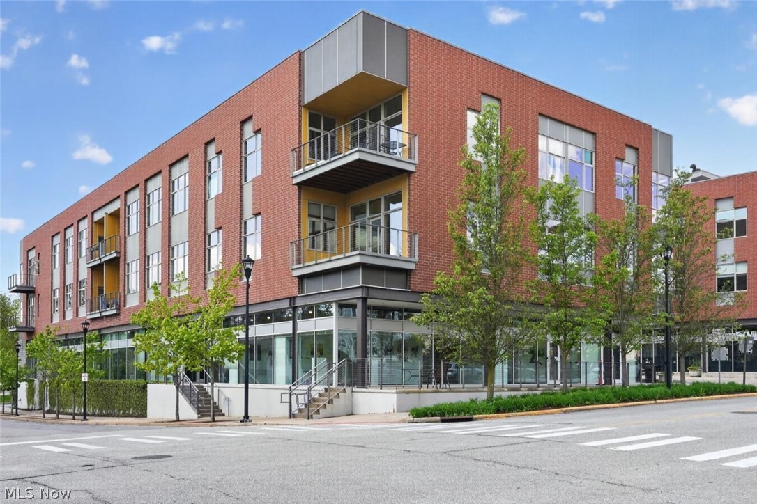 This spacious, fully accessible, two-bedroom condo located in Oberlin downtown is move-in ready! A welcoming foyer with generous storage closets provides a private entryway that leads to the large living and dining areas that allow total flexibility to accommodate your unique lifestyle. The residence features tall ceilings throughout, offering plenty of natural light and cross-ventilation through energy-efficient windows with transoms. The two bedrooms are on either side of the living areas, ensuring privacy from each other. The kitchen boasts elegant granite countertops, a breakfast bar for informal dining, plenty of cabinets and drawers, and a full suite of energy-efficient appliances, including a refrigerator, electric stove, dishwasher, and microwave. An adjacent private, east-facing balcony is the perfect spot for your morning tea or coffee with views of the local neighborhood and streetscape. While one bathroom has a walk-in shower, the second one features a walk-in bathtub with seat, handrails, and water-jets for massage.Built with a high-performance envelope, this home ensures superior thermal comfort and lower utility costs. Modern convenience is prioritized with elevator access, in-unit fully equipped laundry room, central air, secure entry system at the building entrance, and availability of high-speed internet. Reserved outdoor parking space is included with optional garage parking available. Experience the ease of a pedestrian lifestyle by enjoying some of the best restaurants, cinema and theater halls and parks in the area, including local libraries, stores, salons, cafes, post-office and banks, as well as historic landmarks, art and parks! A shaded paved courtyard on the premises, as well as a cafe and a restaurant allows for places to mingle with neighbors, family and friends. Be part of a vibrant neighborhood - schedule your private or in-person tour today!