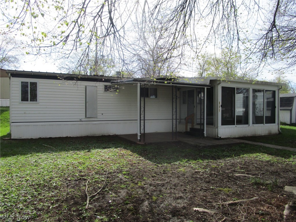 Call your Agent !! Super clean, well maintained and move in ready! Don't miss this 2 bedroom mobile with an adorable kitchen featuring butcher block counters and a sunny dining room with plenty of built-ins for your extra kitchen items. Enjoy morning and evening snacks and beverages on the breezy sunporch - prior tenants also used it in the winters since it heated easily by opening a LR window. There's also a 13x10 concrete patio, just perfect for your picnic table and grill! Nice sized living room- 2 bedrooms - a full bath with a handy step-in shower!... all on one floor - all on a quiet secluded lot. Sellers are including the stove, fridge, washer and dryer, along with the handy 11x10 shed, which has electric and a small storage loft area. Additional features include the updated electrical panel and a handy closet in the living room for extra coats and storage. Taxes are unbelievably low, at 29.00 per year. Parkwood Village offers a clean, well kept park with a peaceful rural vibe. Wind through the curving streets, past the tranquil pond with its floating geese and enjoy the mature trees scattered throughout. This spot is just minutes from Route 11, Route 84, shopping, fine dining, Lake Erie, historic Bridge Street, medical facilities, parks, beaches, wineries and more. Management must approve all buyers in this established 35+ years park. Ask your Agent for the forms, rules, regs, etc that are provided in the supplements section. Current rent is 269.00 per month. See the supplements for charges for pets, and discounts for seniors, in the supplements section.There are a few pet restrictions. Residents pay their own water, sewer, heat, electric and trash. Residences must be owner occupied; no renting, leasing or sub-leasing is permitted.This is a 1971 Buddy, Model CL60122BFDRAS, Serial # BE2625E. If you don't have cash and need a loan, the Listing Agent can provide contact info for a few potential mobile home lenders - have your Agent reach out!.
