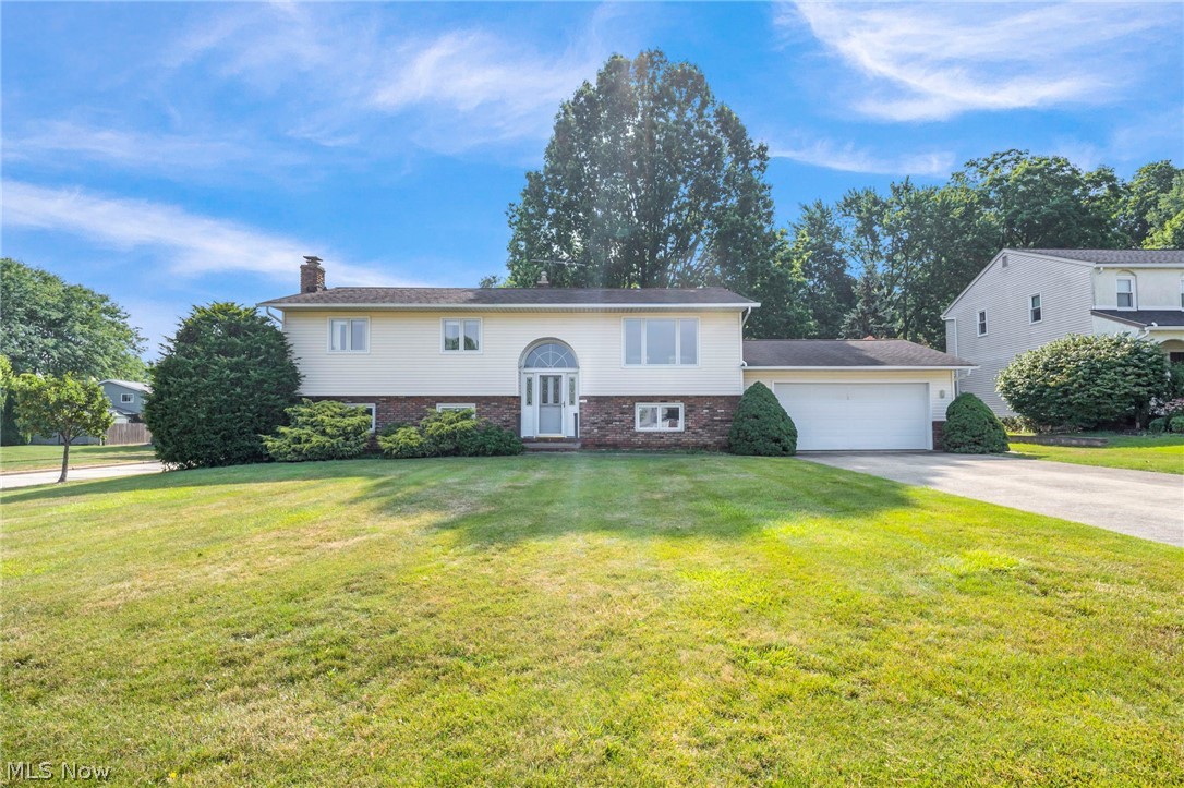 Pride of ownership is evident throughout this one-family-owned home, thoughtfully maintained and updated over the years, and ideally situated on a spacious .30+ acre cul-de-sac street in the Halle Estates neighborhood in Willoughby. Offering over 2,280 sq ft of living space with 4 bedrooms, 2 full baths, multiple indoor and outdoor areas, and numerous updates throughout. Enjoy the large backyard complete with a deck, patio, and storage shed, along with an attached 2-car garage. The upper level features a bright living room with a large picture window, an updated eat-in kitchen with granite countertops, tile backsplash, all appliances included, and an adjoining dining area with sliding doors leading to the deck. The lower level provides exceptional additional living space with a spacious family room featuring a brick fireplace with a wood-burning stove, a built-in bar, and a large laundry room with built-in cabinetry. Recent improvements include a water heater (2021), stove (2026), dishwasher (2023), garage door opener (2020), refreshed bathrooms, and much more. Additional updates completed over the years include the roof, vinyl siding, front entry door including adding architectural design with Palladian window, renovated kitchen and added a skylight, replacement of windows, sliding glass door, garage floor surfacing, and more. All kitchen appliances, washer, dryer, all window treatments and a home warranty are included. Point of sale completed. Property will transfer violation-free. Conveniently located near I-90, OH-2, US-20, and OH-91, with easy access to schools, parks, shopping, restaurants, and other local amenities.