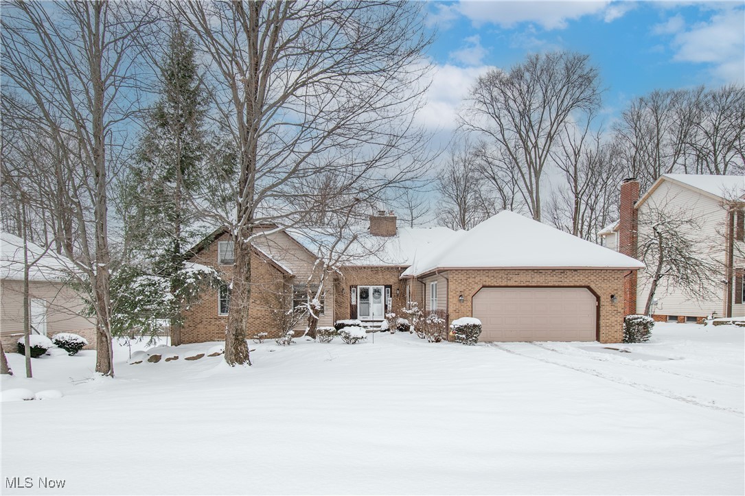Welcome home to this spacious 4-bedroom, 3-bath ranch-style residence nestled in the heart of Twinsburg. Offering over 2,500 sq ft of well-maintained living space, this home features an open floor plan with vaulted ceilings, creating a bright and airy atmosphere throughout. The main level showcases all-new flooring installed in 2022, a beautifully updated kitchen with new cabinetry (2022), and a remodeled first-floor bathroom. First-floor laundry adds everyday convenience, while the versatile loft provides the perfect space for a home office or playroom. Recent mechanical updates include a new furnace and air conditioning system installed in 2019, offering peace of mind for years to come. A one-year home warranty is included for additional peace of mind. Ideally located near golf courses, shopping, and public transportation, this home blends comfort, functionality, and location. Don’t miss your opportunity to own this move-in-ready Twinsburg gem.