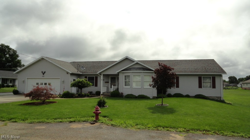 Immaculate 3-4 bedroom, 3.5 bath ranch.  Spacious living area.  Oak kitchen with breakfast bar and Corian counters includes the appliances.  First floor laundry with built in cabinets.  Walk in closet in the master bedroom.  Corner garden tub, double sinks and separate shower in the master bath.  Finished 13 course lower level includes a rec room with ventless gas fireplace, kitchenette and 4th bedroom.  The 2 car attached garage boasts a 24 X 20 attached workshop with separate gas furnace, built in cabinets with counters and shop lighting.  16 X 10 storage shed.  Enclosed porch with ceiling fan leads to the 12 X 12 patio and large backyard.  Nearly 1 acre in an excellent south side location.  Taxes reflect the seller receiving a homestead credit of $395.46 annually.  Electric hot water heater rented at $18+/- per month.  Exclude range and refrigerator in the lower level.  Subject to seller finding suitable housing.