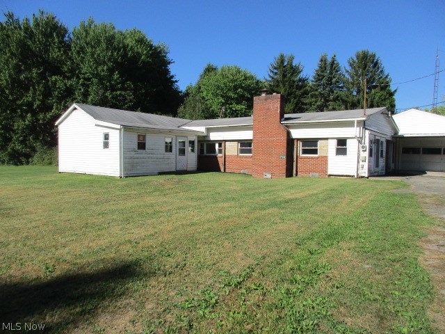Country setting & close to Berlin lake.  3-4 bedroom ranch home with full bath & wood burning fireplace.  Large 2 car attached garage w/ extra storage , workshop & wood burning furnace.