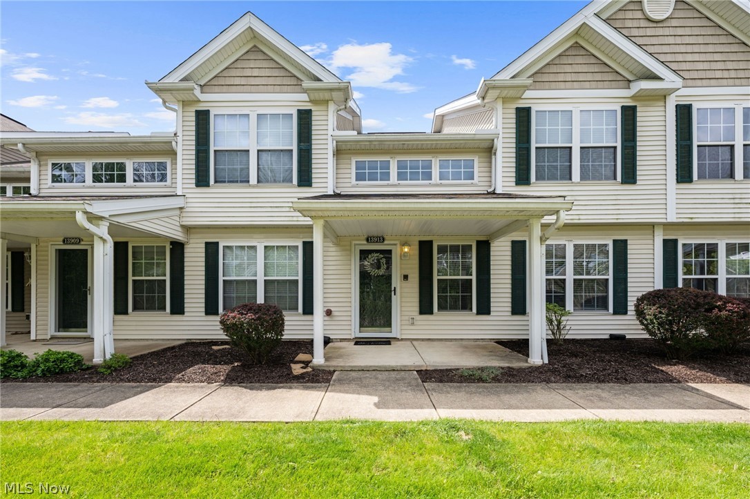 Turn-key, low-maintenance living in Woodcroft Glen! A covered front porch welcomes you into a bright main level with updated LVT flooring and an easy, comfortable flow from the dining area into the living room. The living room offers a cozy gathering space and opens nicely to the refreshed kitchen, complete with quartz countertops, a farmhouse sink, subway tile backsplash, breakfast bar seating, and included appliances. Just off the kitchen, the main-level laundry adds everyday convenience. A first-floor bedroom and full bath create flexible living options, whether used as a primary suite, guest space, or office. Upstairs, a charming loft landing leads to two additional bedrooms, including a spacious bedroom with great closet space, along with a second updated full bath. Enjoy peace of mind with thoughtful updates throughout, including fresh paint, updated bathrooms, a newer garage door, a high-efficiency furnace, and a newer hot water tank. With an attached garage and an HOA that covers exterior maintenance, landscaping, snow removal, trash, reserves, and more, this home offers a truly stress-free lifestyle. Conveniently located near I-71, Strongsville shopping and dining, everyday amenities, and North Royalton schools, this beautifully updated townhome is clean, comfortable, and move-in ready!
