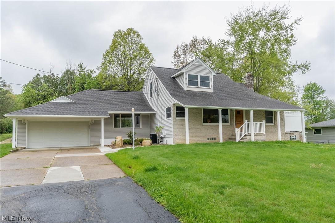 Be prepared to fall in LOVE with all 5644 Grove Rd has to offer! Privacy, seclusion, acreage, workshop and an immaculate home await you. One owner, custom built house is full of character with a stunning kitchen, gorgeous hardwood flooring, finished basement complete with fireplace and additional kitchen, endless storage, and plenty of room to entertain. Remodeled kitchen boasts heated ceramic tile, glossy onyx colored granite counters, solid maple custom cabinetry, decorative lighting and endless storage! Inviting eat-in kitchen area leads to rear, private deck with a gorgeous view of nature. First floor master bedroom adjoins enclosed terrace; perfect for morning coffee. Lower level has additional kitchen area, full bathroom, stone fireplace, new carpet and plenty of storage space. YES.....so much storage space is here, you'll be amazed! Looking for a HUGE workshop or mechanic's garage? Look no further! Updates include new well/submersible pump, water softener system, roof, HWT, gara